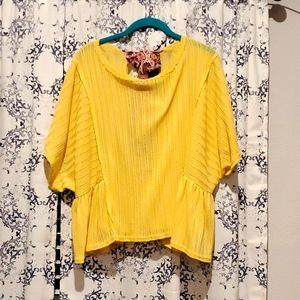 yellow flowy top with bow
